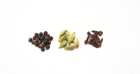 Group of Organic Black pepper isolated on white background. Selective focus and Top view (Flat Lay)