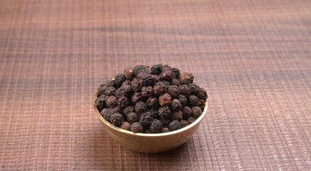 Group of Organic Black pepper isolated on white background. Selective focus and Top view (Flat Lay)