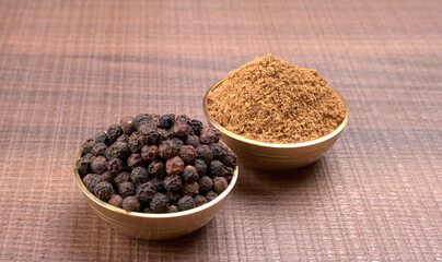Group of Organic Black pepper isolated on white background. Selective focus and Top view (Flat Lay)