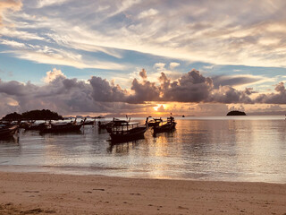 Beach sunrise of the sea with sky and cloud in twilight over light the sun, Dramatic sea with sunset and sunrise sea twilight