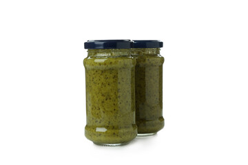 Jars of Pesto sauce isolated on white background