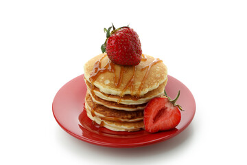 Pancakes with strawberry and caramel isolated on white background