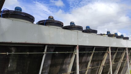 Fototapeta premium Cooling system for industrial heat exchangers. Industrial fan cooling tower. Water spray nozzle close up