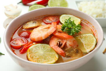 Plate of tasty Tom yum soup, close up