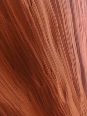 Red and Orange Rocks in Antelope Canyon with blue sunny sky behind