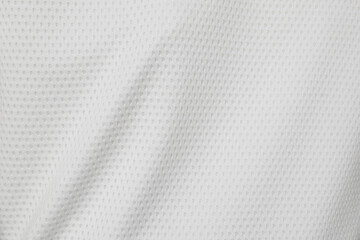 Fototapeta na wymiar White sports clothing fabric football shirt jersey texture background