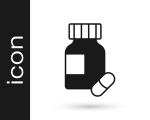 Black Sedative pills icon isolated on white background. Vector