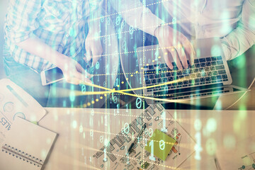 Double exposure of man and woman working together and data theme hologram drawing. Computer background. Top View.