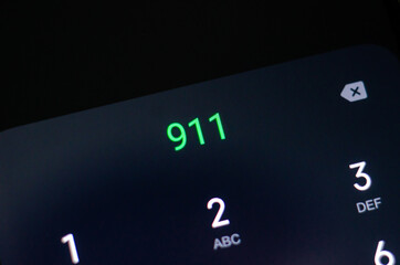 Emergency number 911 displayed on a  cell phone.