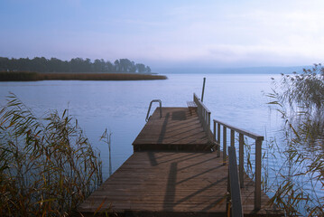Fototapeta premium morning at lake pier