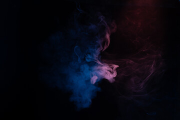 Blue and pink steam on a black background.