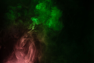 Green and pink steam on a black background.