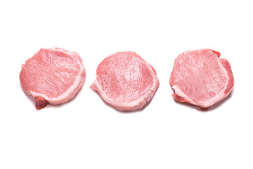 Raw pork pieces isolated on a white background.