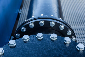 Large pipe connection with a large number of bolts and nuts enclosed on it. Pipeline. Pipeline state transportation system.
