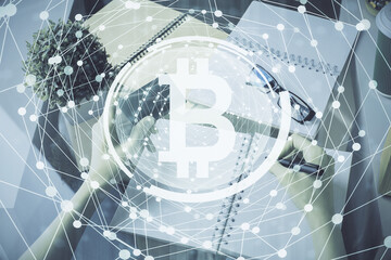 Multi exposure of woman on-line shopping holding a credit card and crypto theme drawing. Blockchain E-commerce concept.