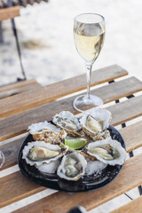 Fresh oysters and white wine on a terrace