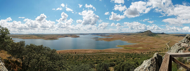 Panoramic view of a water reservoir in southern Spain in a clear spring day