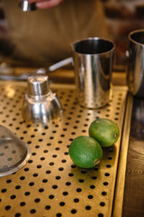 two limes on bar table
