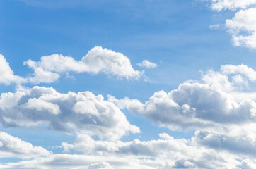 White clouds in a bright blue sky. The beauty of the nature