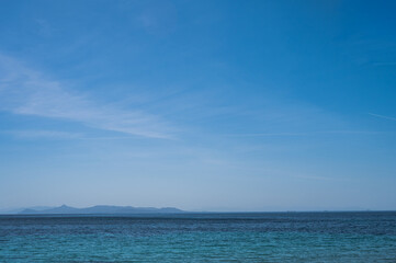 Fototapeta premium Scenic landscape of Aegean sea at sunny summer day. Athens, Greece. Silhouettes of islands in mist.