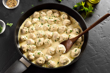 Swedish meatballs with white creamy sauce