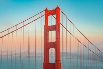 Amazing view of the famous Red Golden Gate Bridge and colorful sunset sky in San Francisco