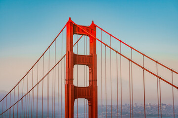 Amazing view of the famous Red Golden Gate Bridge and colorful sunset sky in San Francisco