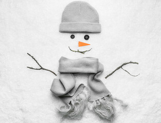Funny snowman made on snow outdoors