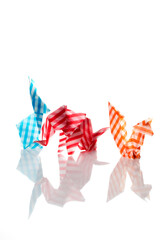 Mixed origami animals over white background. Handmade art made with colored paper.
