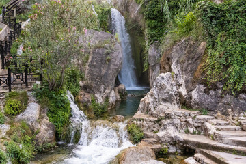Fototapeta na wymiar Water cascades in the Algar river, in Callosa d'en Sarrià, in Alicante (Spain).
