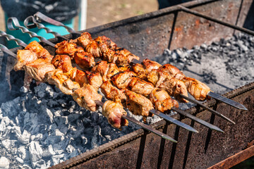 The process of cooking barbecue on the grill