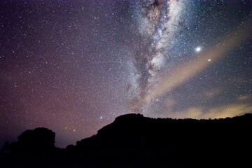 milky way galaxy over the mountains