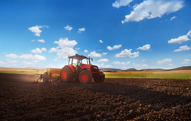 Fototapeta premium Red tractro in the field!