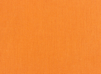 Closeup of orange textile. Fabric details backdrop