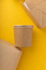 Plastic boxes for food delivery on bright background