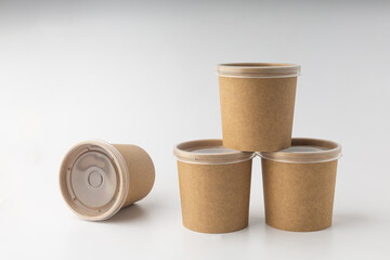 Non-plastic cups for soup delivery on white background