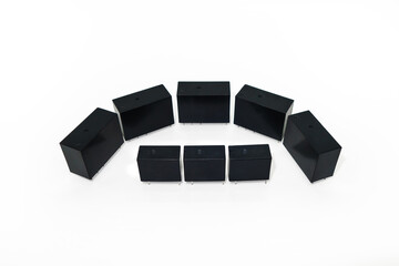 Group of solid-state relays located in concept way. Black objects on white background