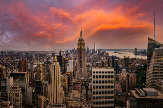 New York City Midtown with Empire State Building at Amazing Sunset, Sunset view of New York City looking over midtown Manhattan © modernmovie