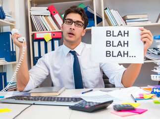 Busy frustrated businessman angry in the office
