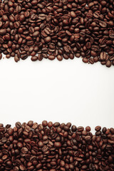 Coffee beans isolated on white. Vertical image