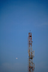 Telecommunication cell tower isolated over blue sky