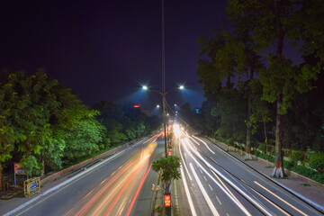 Long exposure photo of an Indian roadway, vehicle in motion