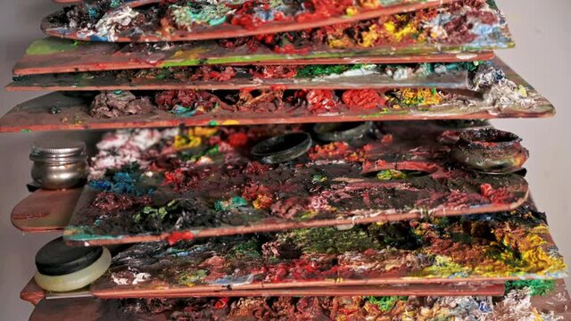Stack of used palettes in a studio