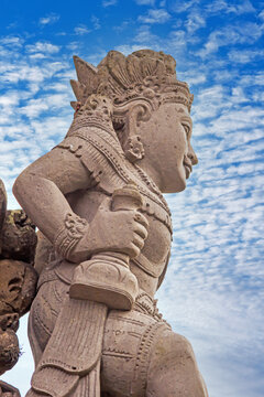 Image of a typical Balinese sculpture photographed against the blue sky