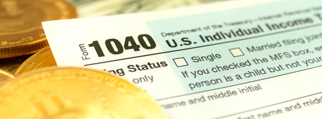 Concept of paying the taxes with cryptocurrency, 1040 US Individual Income Tax Return form, banner