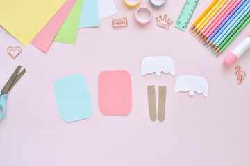 DO IT YOURSELF. Paper ice cream with kids at home. Step-by-step instructions. Top view. Step 2. Cut out the shape. Popsicle