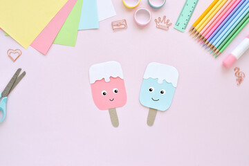 DO IT YOURSELF. Paper ice cream with kids at home. Step-by-step instructions. Top view. Step 3. The colored paper popsicle is ready. Popsicle