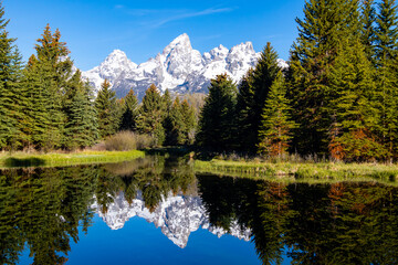 Schwabacher Landing in the early morning in Grand Teton National Park, Wyoming, with mountain reflections on the Snake River