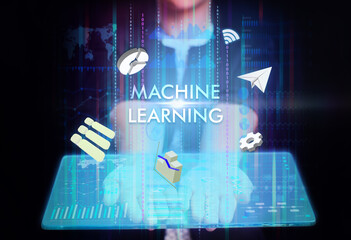 Business, Technology, Internet and network concept. Young businessman working on a virtual screen of the future and sees the inscription: Machine learning
