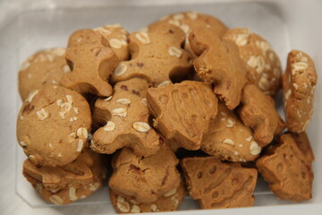 Ginger bread cookies homemade cooking for Christmas traditional dessert. Kids and family love to prepare to make dough and bake them. Then paint them with sugar paste to decor in many colors.